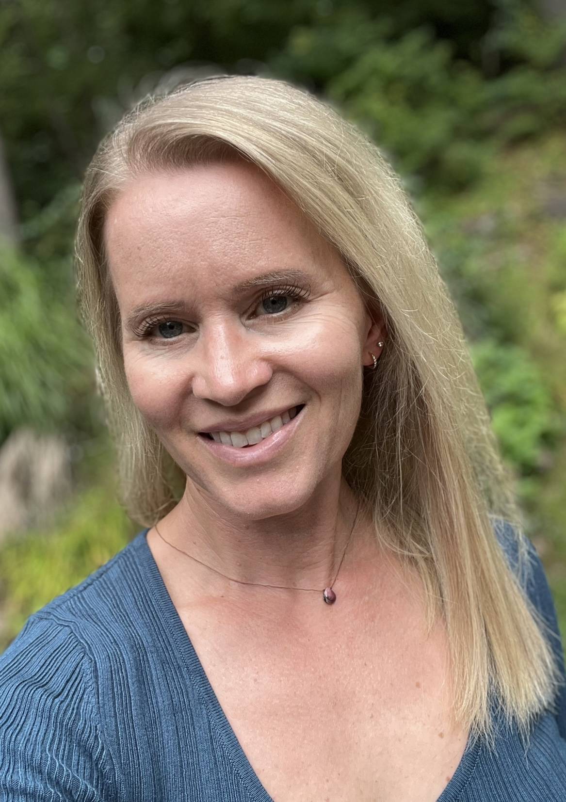 Nicole Johnson with two boys hugging 